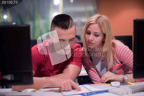 Image of technology students group working  in computer lab school  class