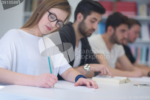 Image of group of students study together in classroom