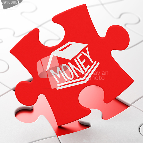 Image of Banking concept: Money Box on puzzle background