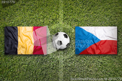 Image of Belgium vs. Czech Republic flags on soccer field