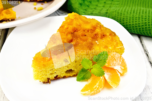 Image of Pie mandarin with mint on table