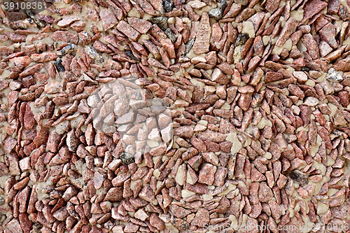 Image of Wall of brown granite gravel