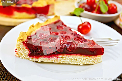 Image of Tart cherry with berries on board