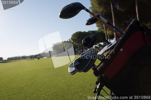 Image of close up golf bag on course