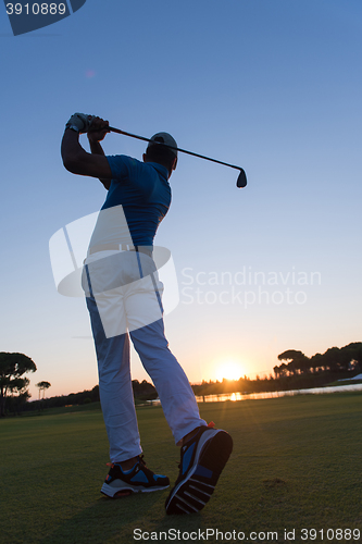 Image of golfer hitting long shot