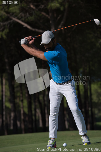 Image of golf player hitting shot