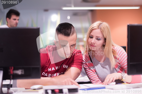Image of technology students group working  in computer lab school  class