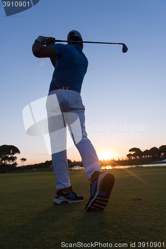 Image of golfer hitting long shot