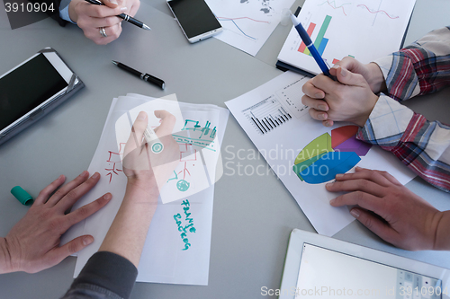 Image of top  view of business people group brainstorming on meeting