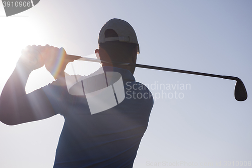 Image of golf player hitting shot