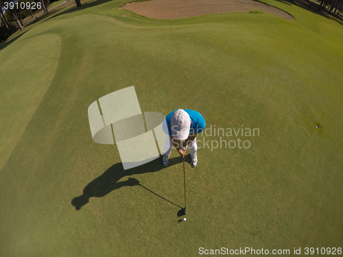 Image of top view of golf player hitting shot