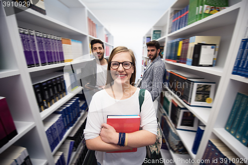 Image of students group  in school  library