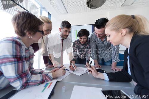 Image of top  view of business people group brainstorming on meeting