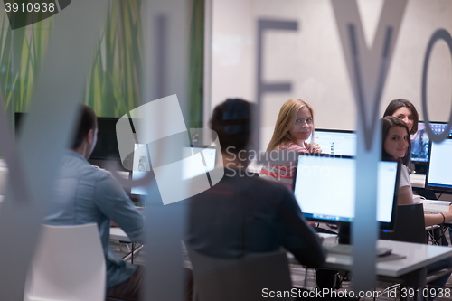 Image of technology students group working  in computer lab school  class