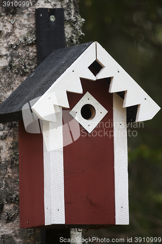Image of red bird house