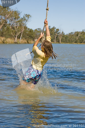 Image of girl swinging