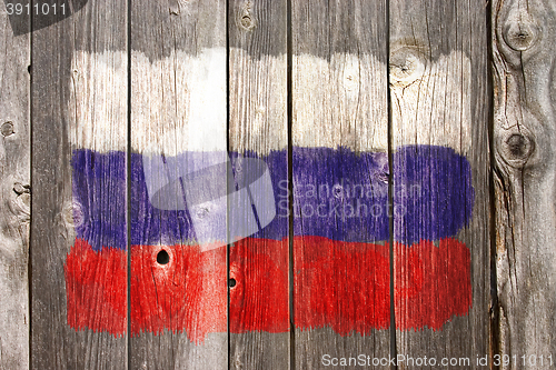 Image of russian colors on old wooden wound