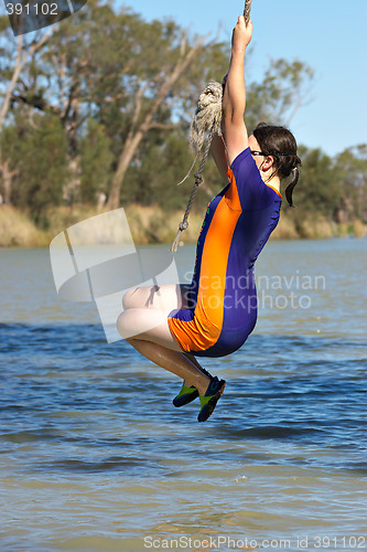 Image of girl swinging