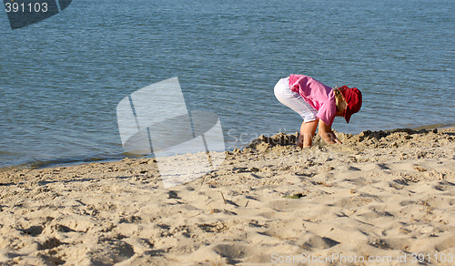 Image of playing on the beach