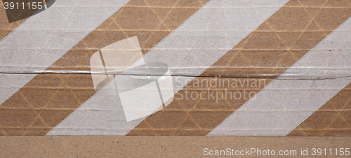 Image of Packet parcel with striped tape