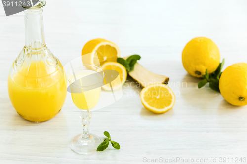 Image of Italian traditional liqueur limoncello with lemon