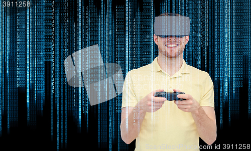 Image of happy man in virtual reality headset with gamepad