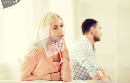 Image of unhappy couple having argument at home