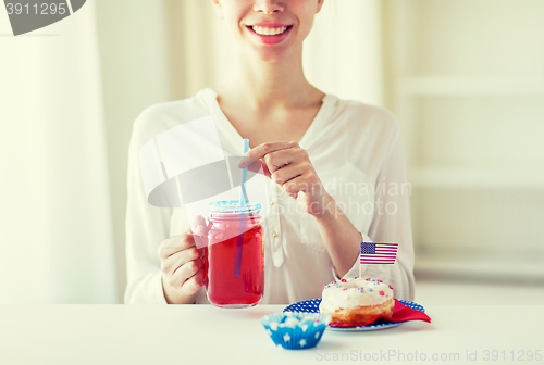 Image of happy woman celebrating american independence day