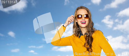 Image of happy young woman or teen girl in casual clothes