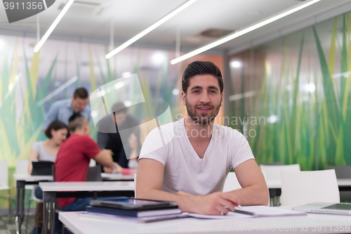 Image of male student in classroom