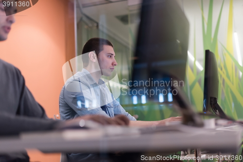 Image of technology students group working  in computer lab school  class