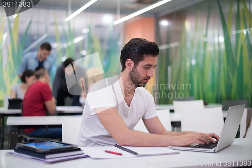 Image of male student in classroom