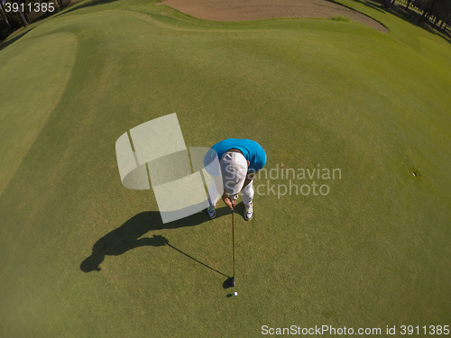 Image of top view of golf player hitting shot