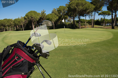 Image of close up golf bag on course