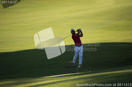 Image of golf player hitting long shot