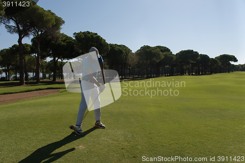 Image of golf player hitting shot