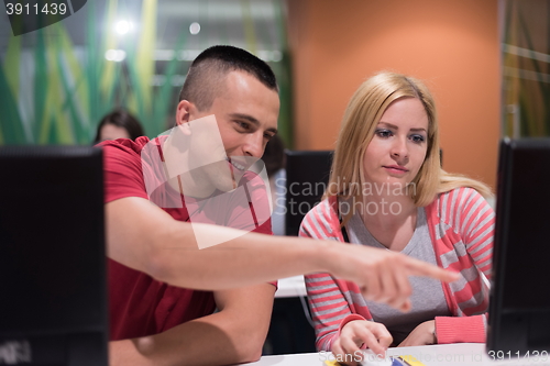 Image of technology students group working  in computer lab school  class