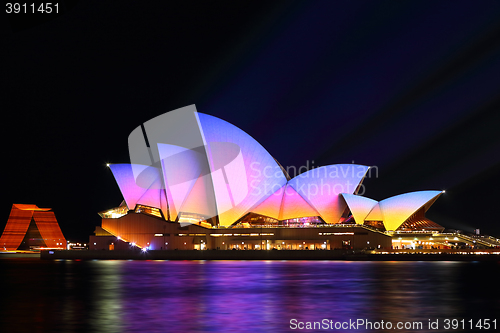Image of Sunrise colours on the Sydney Opera House, Vivid 2016
