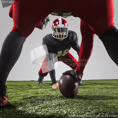 Image of The two american football players in action