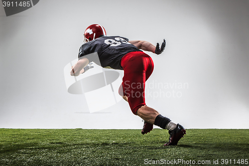 Image of The american football player in action