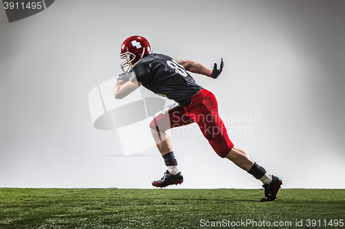 Image of The american football player in action