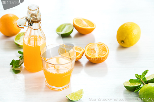 Image of Glass of orange liqueur. Selective focus