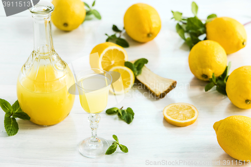 Image of Italian traditional liqueur limoncello with lemon