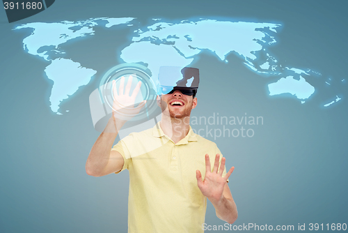 Image of happy man in virtual reality headset or 3d glasses