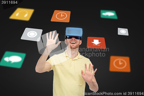 Image of happy man in virtual reality headset or 3d glasses