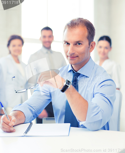 Image of businessman in office