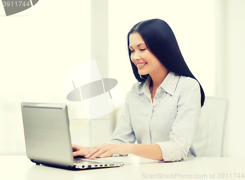 Image of smiling businesswoman or student with laptop