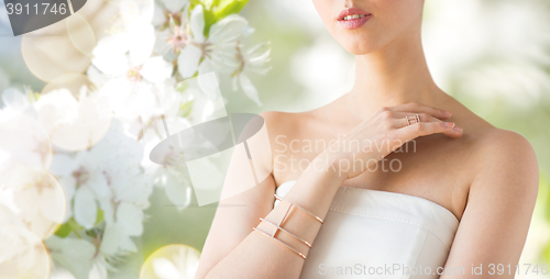 Image of close up of beautiful woman with ring and bracelet