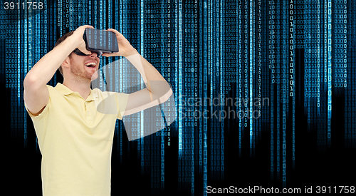 Image of happy man in virtual reality headset or 3d glasses