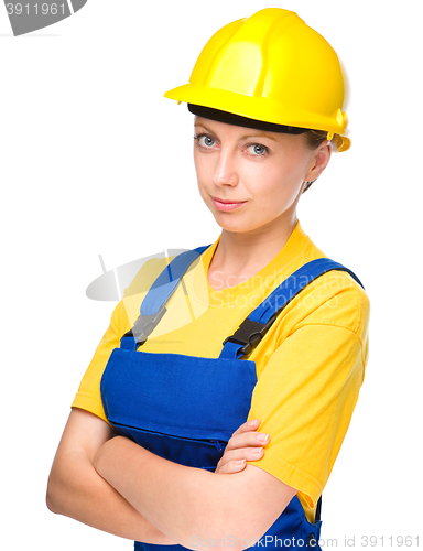 Image of Young lady as a construction worker